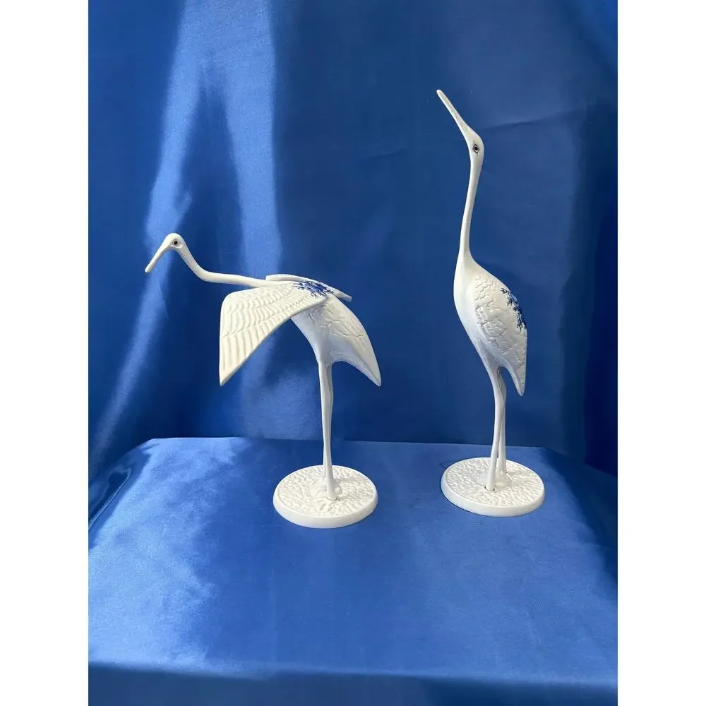 Pair of White Enamel Metal Cranes Accented with Blue Flower Design